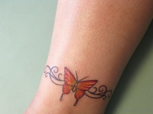 Small Orange Butterfly Tattoo On Ankle
