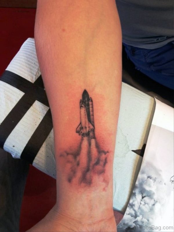 Small Rocket On Cloud Tattoo On Wrist 