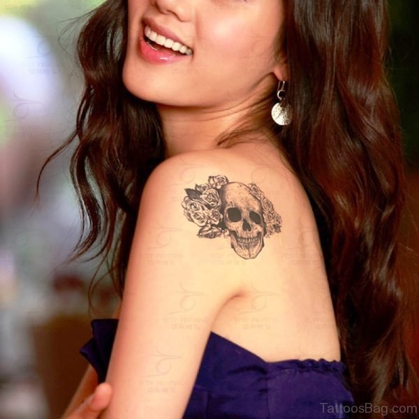 Small Skull And Flower Tattoo 