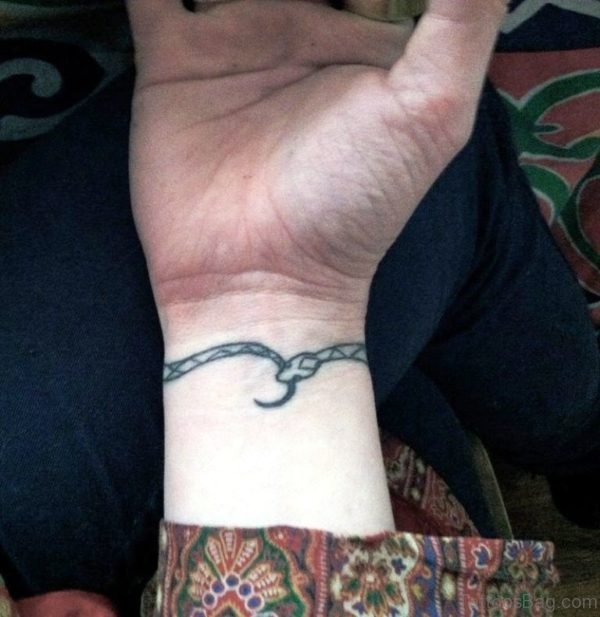 Small Snake Tattoo On Wrist