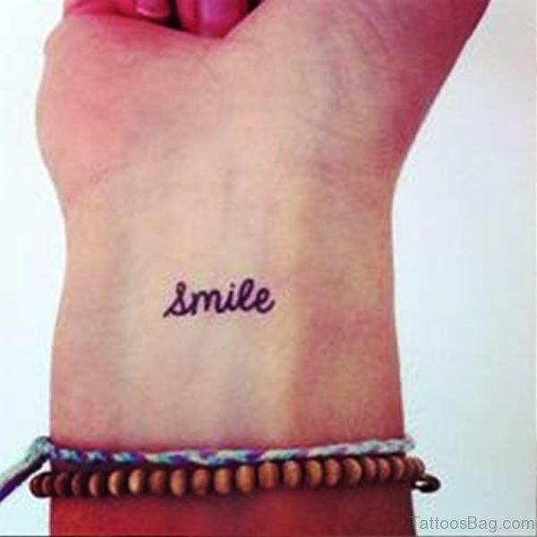 Smile Tattoo On Wrist