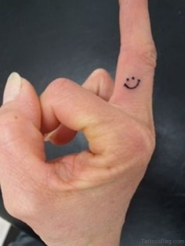 Smiley Tattoo On Finger