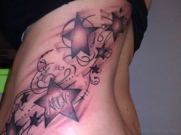 Star Flow Tattoo On Rib