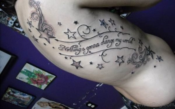 Stars Tattoos On Back Rib