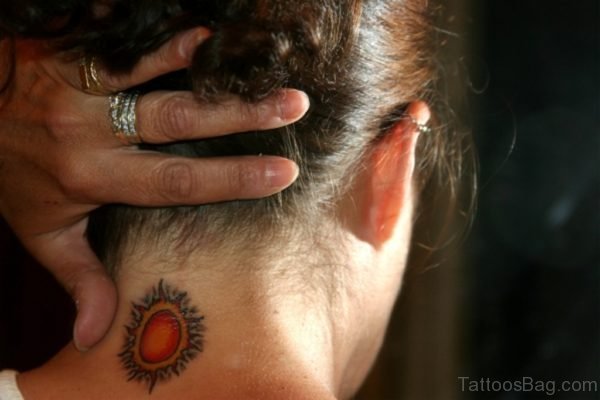 Stunning Orange Sun Tattoo On Neck