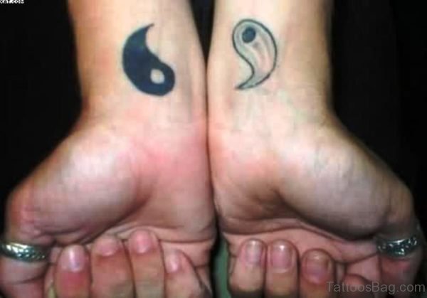 Stunning Yin Yang Tattoo On Wrist