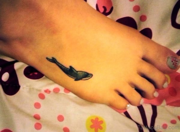Sweet Dolphin Tattoo On Side Foot