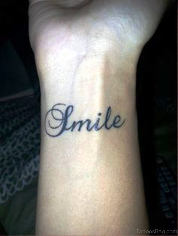 Sweet Smile Tattoo On Wrist