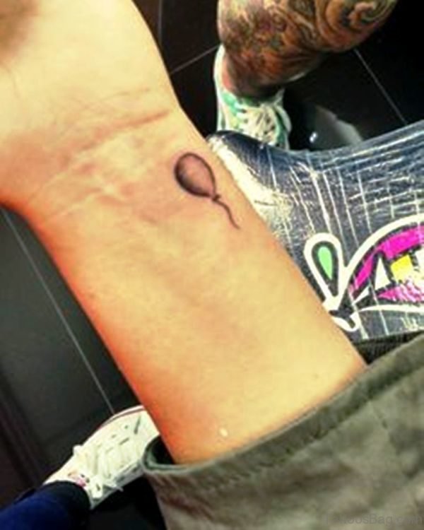 Tiny Balloon Tattoo On Wrist