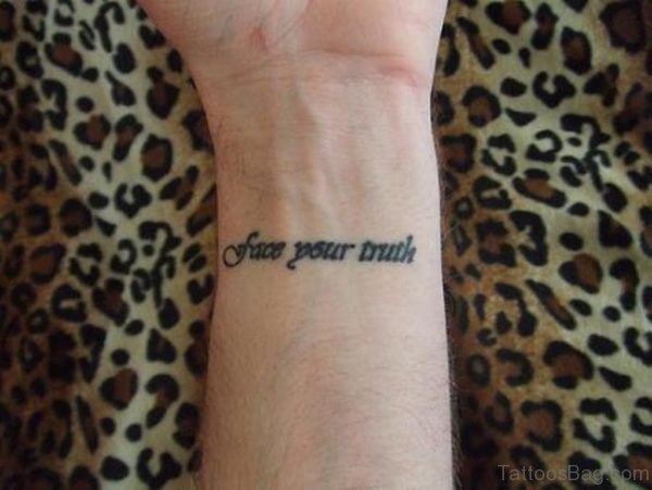 Tiny Wording Wrist Tattoo