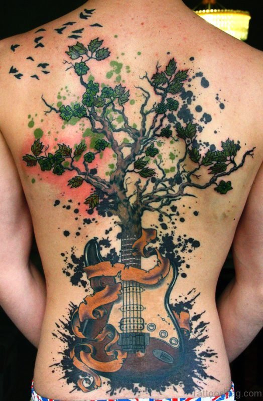 Tree Tattoo With Guitar Design On Back