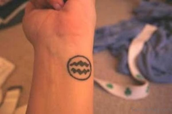Tribal Aquarius Wrist Tattoo