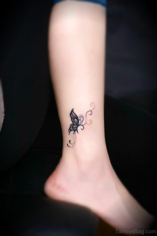 Tribal Butterfly Tattoo On Right Ankle