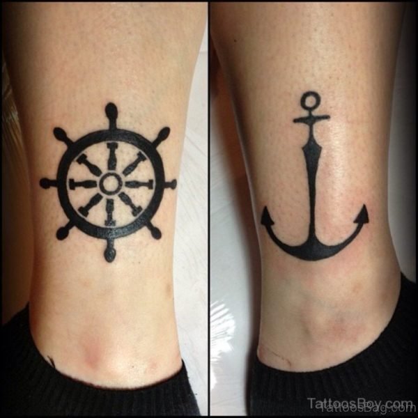 Wheel And Anchor Tattoo On Ankle