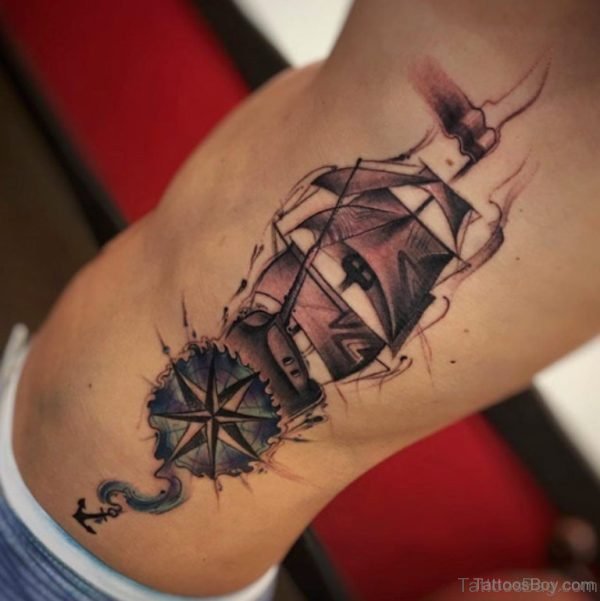Wonderful Compass And Ship Tattoo On Rib