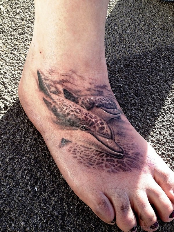 Wonderful Dolphins Design Tattoo On Foot