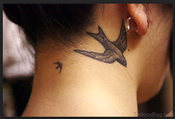 Wonderful Flying Bird Tattoo On Neck