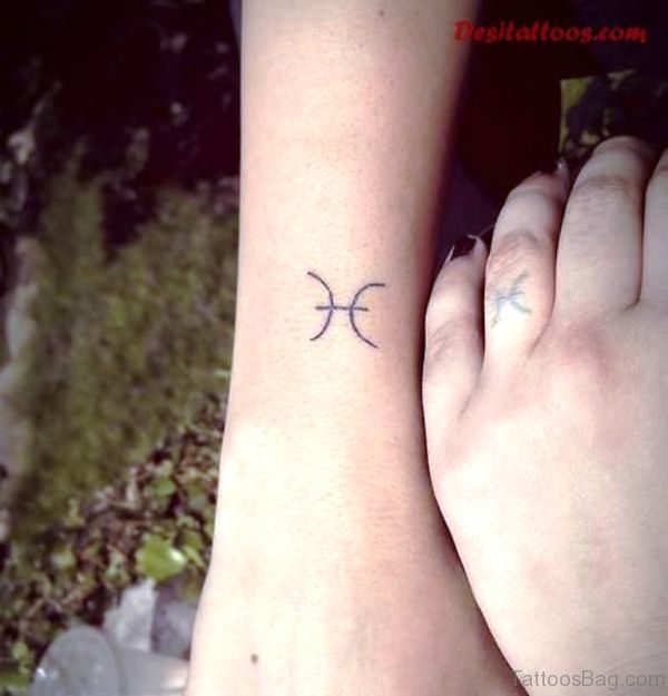 Wonderful Pisces Tattoo On Wrist