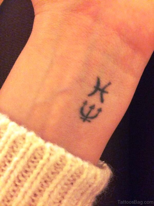 Wonderful Pisces Wrist Tattoo