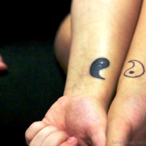 Yin Yang Wrist Tattoo