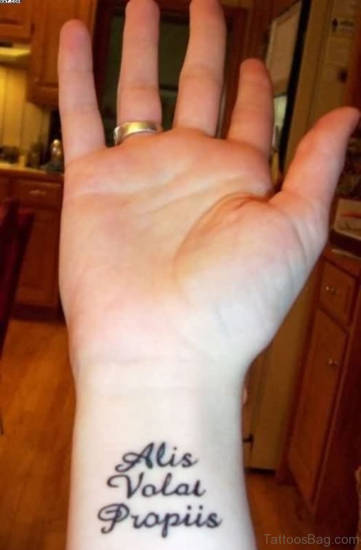 Latin Words Tattoo On Wrist