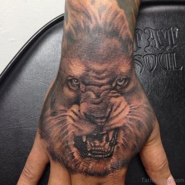 Angry Lion Tattoo On Hand