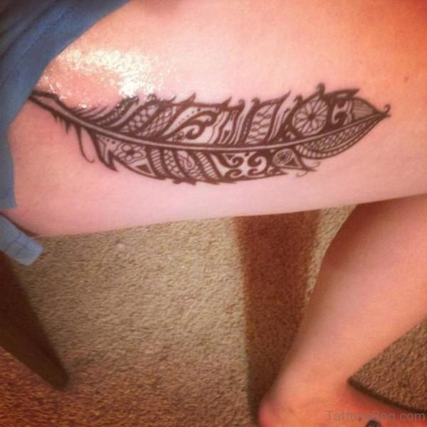 Awesome Feather Tattoo On Thigh