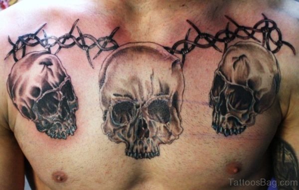 Barbed Wire And Skull Tattoo On Chest