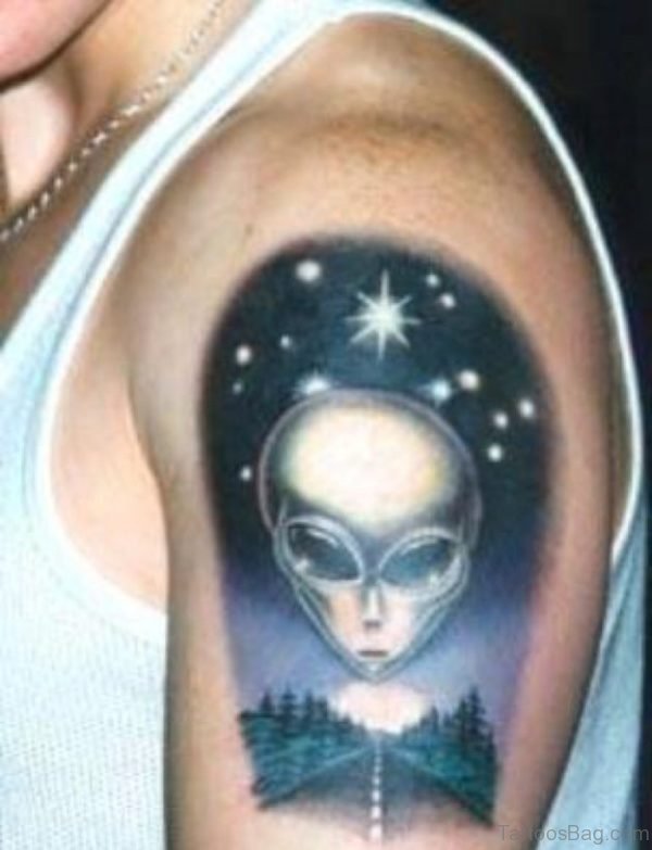 Beautiful Alien Tattoo On Man Left Shoulder