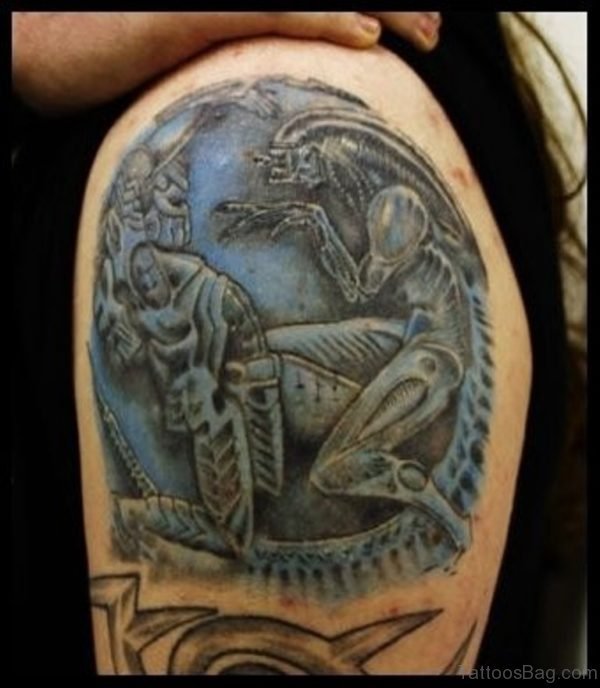Black And Blue Alien Tattoo