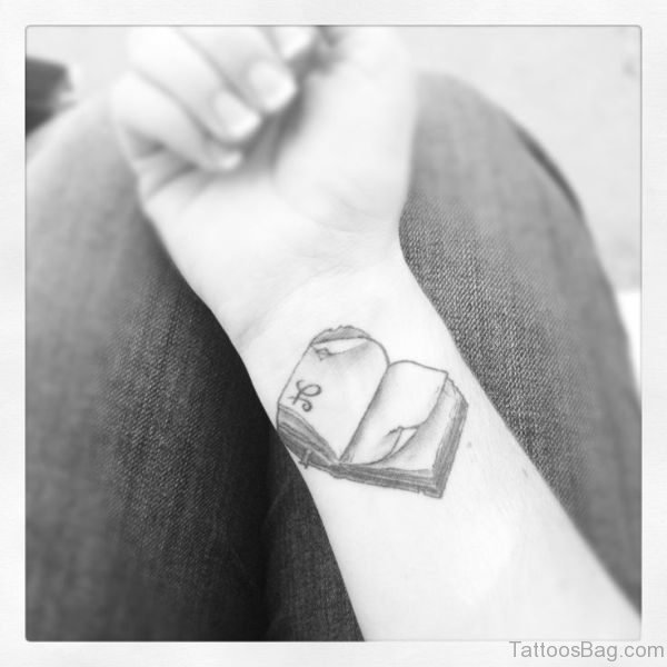 Black And White Book Tattoo On Wrist