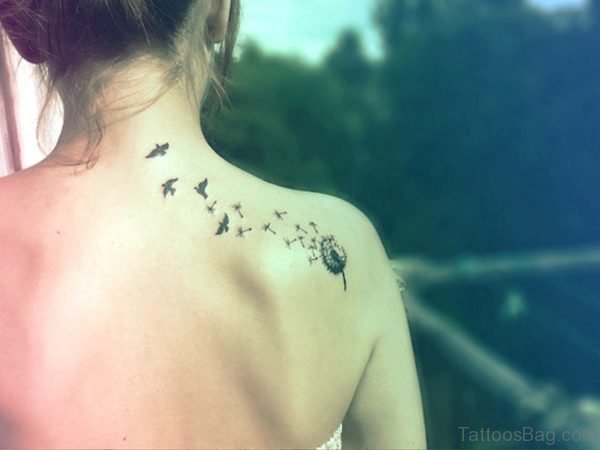 Black Dandelion Tattoo On Back Shoulder