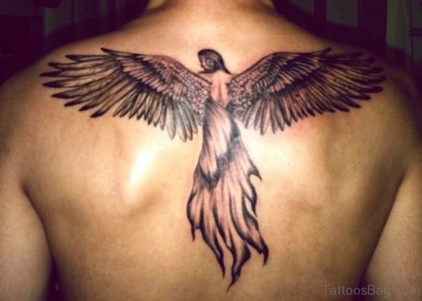 Black Ink Bird Tattoo On Back
