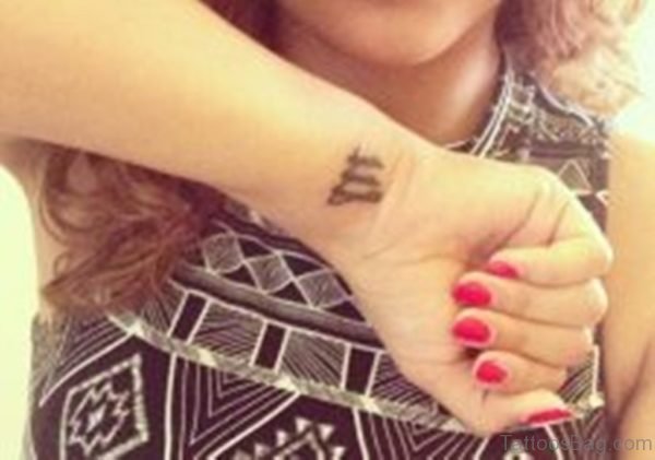 Black Ink Gemini Tattoo On Wrist
