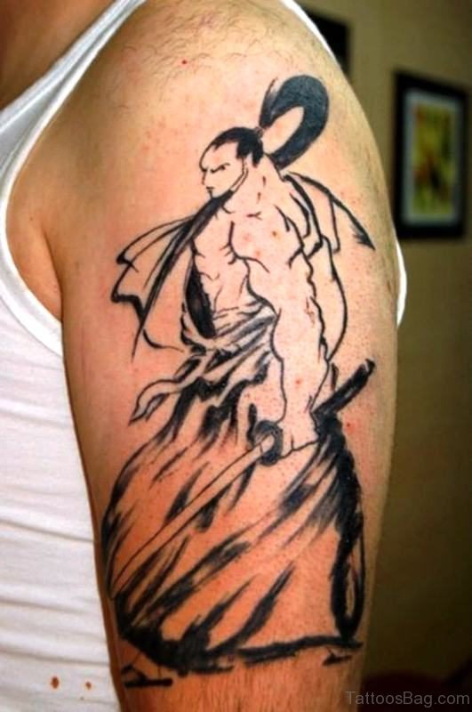 Black Inked Samurai Tattoo On Shoulder