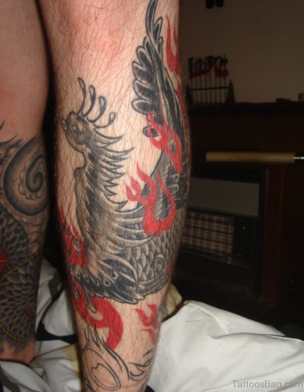 Black Phoenix Leg Tattoo