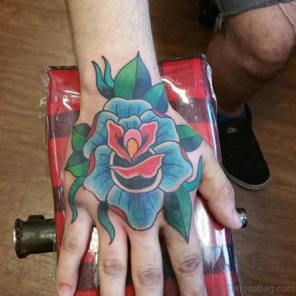 Blue And Red Shade Rose Tattoo