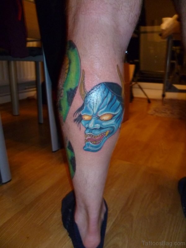 40 Impressive Mask Tattoos For Leg
