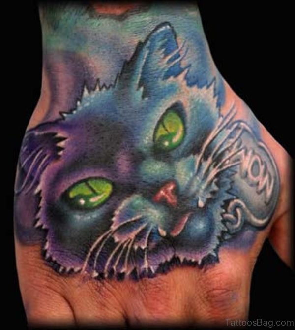 Blue Ink Cat Tattoo On Hand