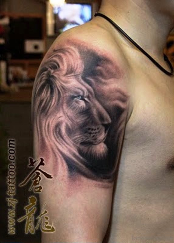 Brilliant Lion Face Tattoo On Shoulder