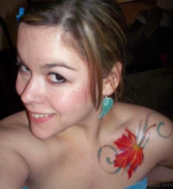 Colored Leaf Tattoo On Girl Shoulder