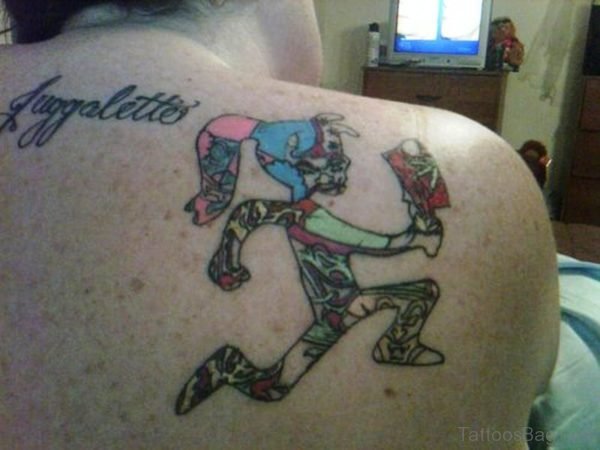 Colorful Hatchet Girl Tattoo On Shoulder