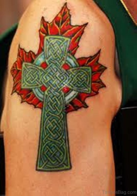 Cross And Leaf Tattoo On Shoulder