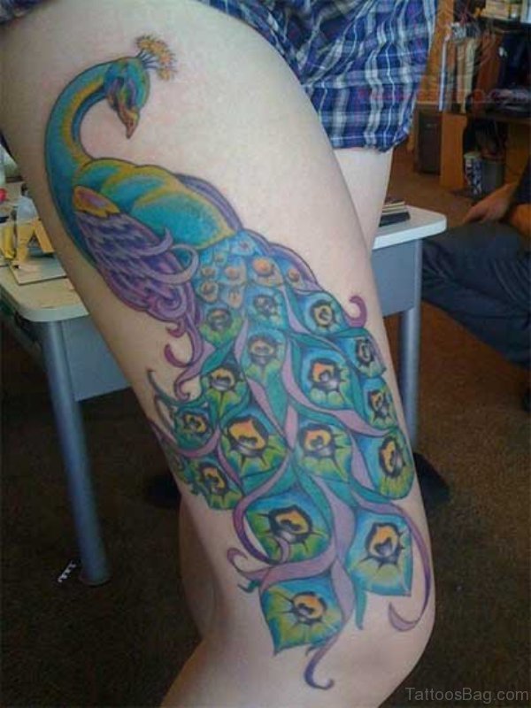 Cute Peacock Tattoo On Thigh