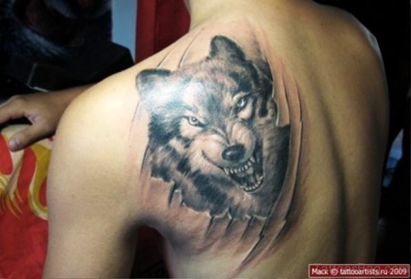 Elegant Alpha Wolf Tattoo On Back Shoulder