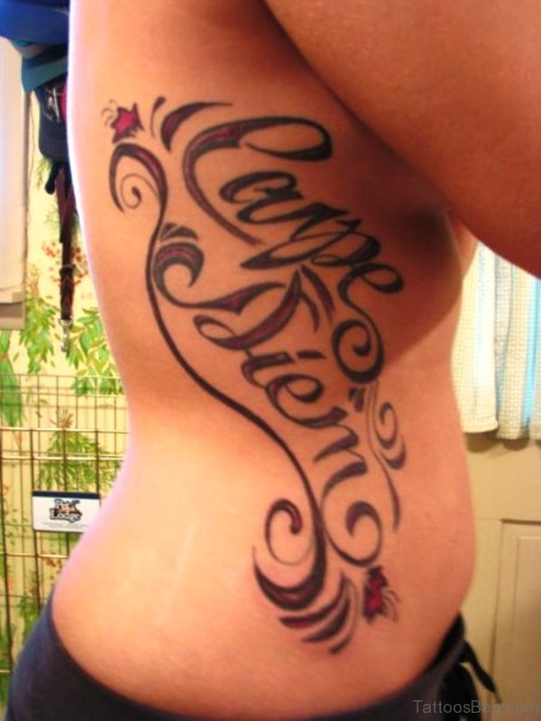 Elegant Carpe Diem Tattoo On Rib