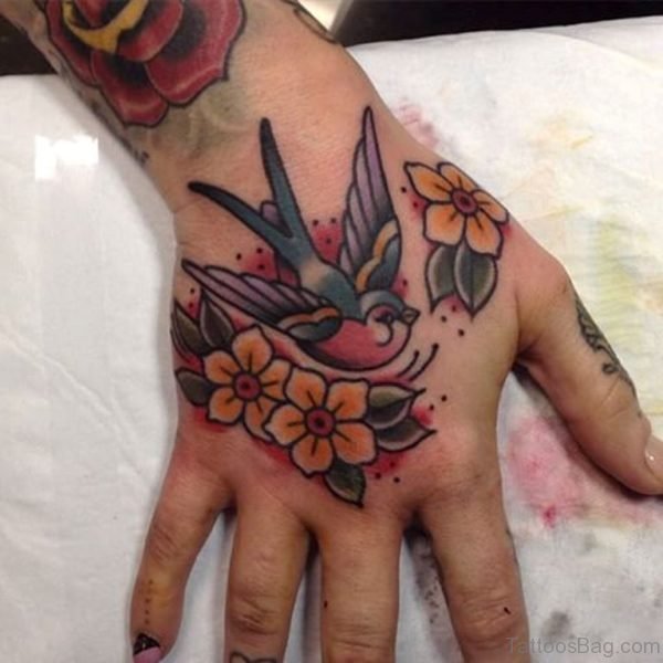 Flower And Swallow Tattoo On Hand