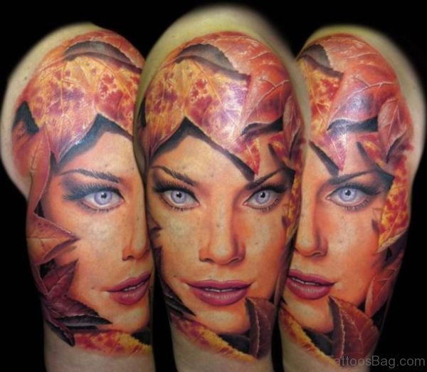 Girl Face And Leaf Tattoo