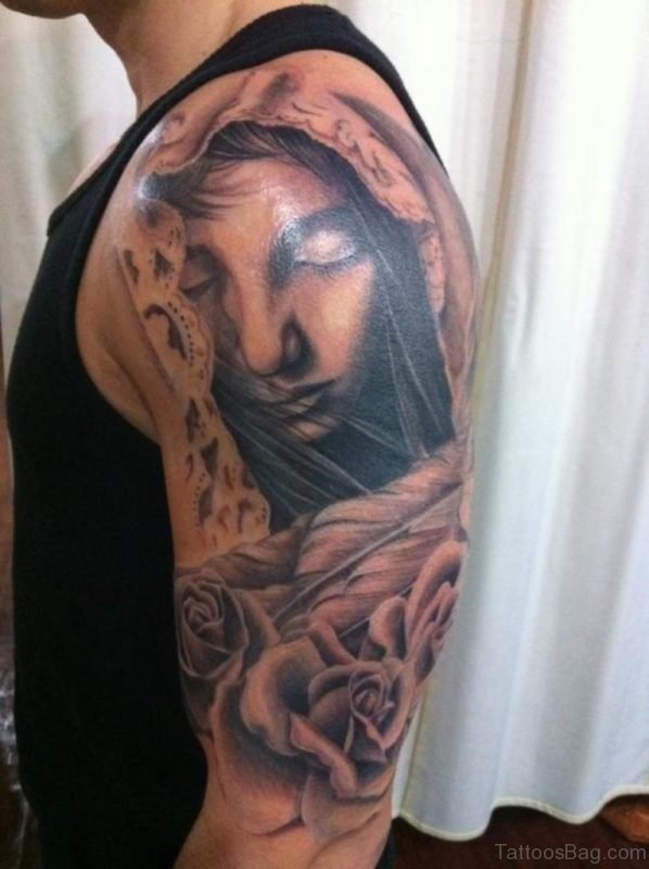Girl Face Tattoo On Shoulder