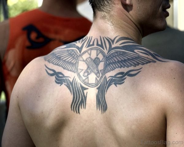 Graceful Tribal Tattoo On Back 